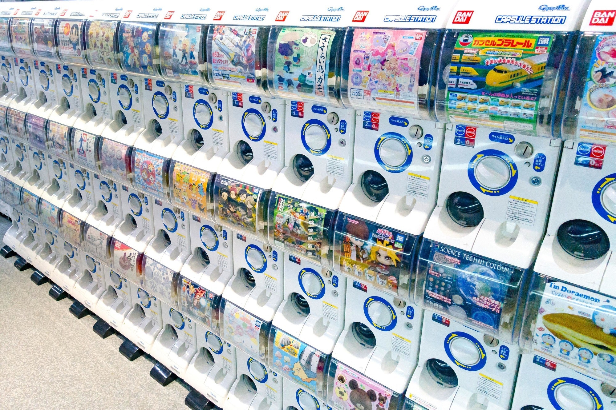 rows of gachapon machines